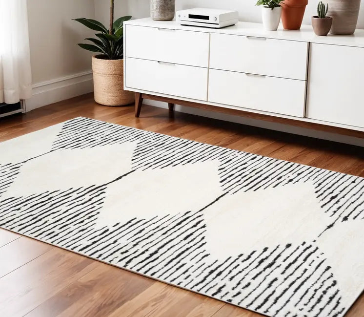 Ivory And Black Geometric Area Rug